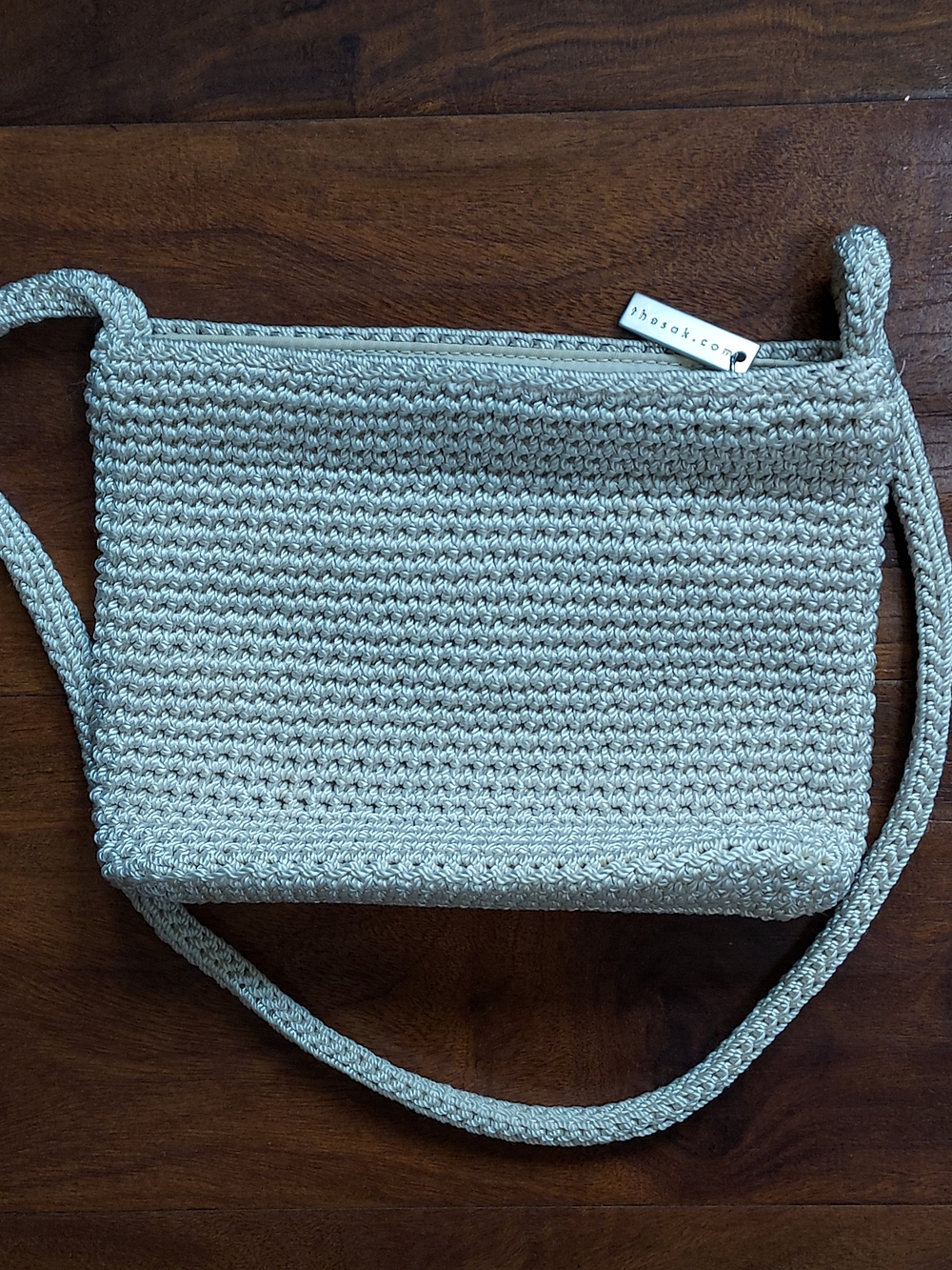 The Sak woven cream crossbody bag